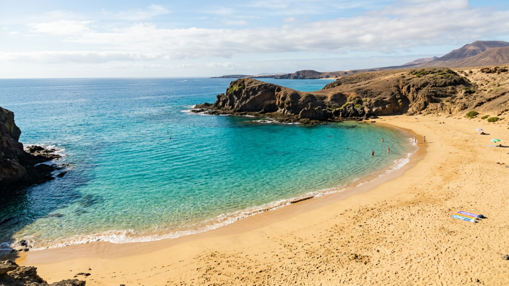 Turquoise cove with golden sand at Papagayo Beach, Lanzarote